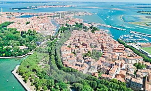 Aerial drone view of Venetian lagoon and cityscape of Venice island in sea from above, Italy