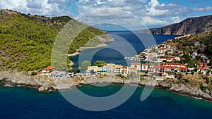 Aerial drone view video of beautiful and picturesque colorful traditional fishing village of Assos in island of Cefalonia, Ionian