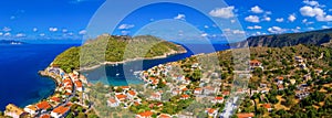 Aerial drone view video of beautiful and picturesque colorful traditional fishing village of Assos in island of Cefalonia, Ionian photo