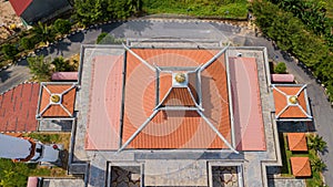 Aerial drone view of a white mosque known as Tun Khalil Mosque at Asahan, Melaka, Malaysia.