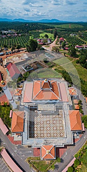 Aerial drone view of a white mosque known as Tun Khalil Mosque at Asahan, Melaka, Malaysia.