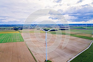 Aerial drone view on wind electricity generator