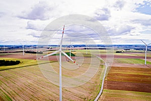 Aerial drone view on wind electricity generator