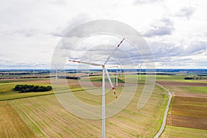 Aerial drone view on wind electricity generator