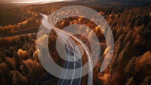 Aerial drone view of a winding road among a beautiful autumn forest at sunset. Generative AI