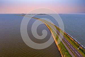 Aerial from the dyke to Marken at the IJsselmeer in Netherlands photo