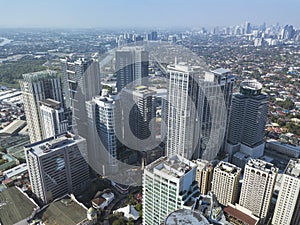 Aerial of Eastwood City skyline and distant BGC and Ortigas further ahead photo