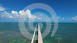 Aerial Epic Bridge Over Ocean. Seven Mile Bridge Florida Keys Drone Flight Cars Driving on Bridge Bright Daylight