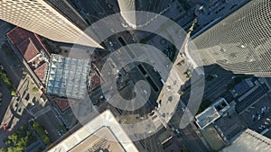 AERIAL: Epic slow lowering and circiling birds eye View over Downtown Los Angeles California in beautiful Sunrise Light