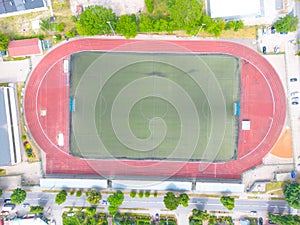 Aerial Establishing Shot of a Whole Stadium with Soccer Championship Match. Teams Play, Crowd of Fans Cheer. Football Tournament,