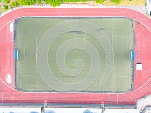 Aerial Establishing Shot of a Whole Stadium with Soccer Championship Match. Teams Play, Crowd of Fans Cheer. Football Tournament,