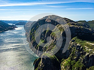 Aerial of famous hiking point in Norway - Pulpit Rock Preikestolen. And Lyse fjord below.