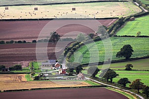 Aerial farm buildings and fields