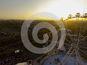 Aerial ferrris wheel in sunset