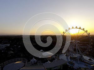 Aerial ferrris wheel in sunset