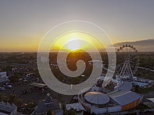 Aerial ferrris wheel in sunset