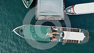 Aerial Ferry Approaching The Pier