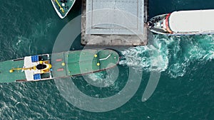 Aerial Ferry Leaving The Pier