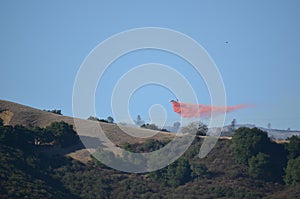 Aerial Firefighting Aircraft Dropping Fire Retardant