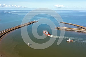 Aerial from a fisher boat leaving the harbor in Harlingen Friesland the Netherlands