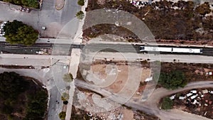 Aerial flight above commuter train.