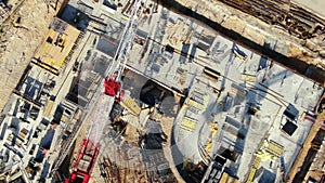 Aerial Flight Over a New Constructions Development Site with High Tower Cranes Building Real Estate. Heavy Machinery and