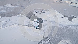 Aerial flight over polar ocean, base. Antarctica.