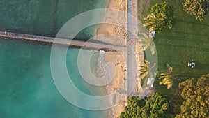 Aerial flight over a tropical beach. Cinematic video shooting. Aerial drone slowly flying over colorful landscape during