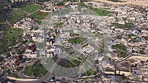 Aerial fly Jerusalem alleys villages and Old city to Temple mount Western wall