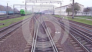 Aerial fly from train tracks on railway