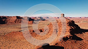 Aerial Flying Canyon With Red Rocks Butte In Dried Desert With Red Sandstone Usa