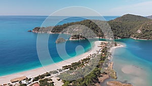 Aerial flying Oludeniz beach and lagoon Beautiful bay, crystal blue water Turkey