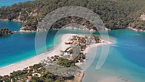 Aerial flying Oludeniz beach and lagoon Beautiful bay, crystal blue water Turkey