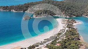 Aerial flying Oludeniz beach and lagoon Beautiful bay, crystal blue water Turkey