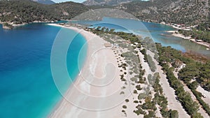 Aerial flying Oludeniz beach and lagoon Beautiful bay, crystal blue water Turkey