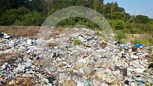 Aerial Flying Over Piles Of Plastic Garbage And Household Waste In A Landfill
