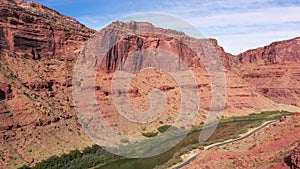 Aerial Flying Over Road Passing In Gorge Of Red Rocks Near Colorado River