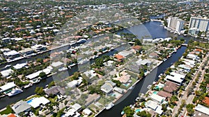 Aerial flyover waterfront homes neighborhood Fort Lauderdale