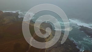 Aerial of fog, ocean, and coastline in Northern California