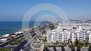 Aerial footage of the beautiful beach resort of Antalya in Turkey showing the beach front and hotels in the summer time