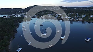 Aerial footage of boat moorings Noosa Heads on Dusk