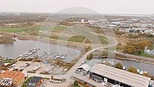 Aerial footage of Brondby Havn harbour in Copenhagen on a cloudy day 1080p 3