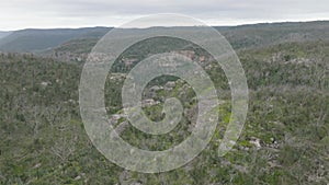 Aerial footage of a large forest recovering from severe bushfire in the Blue Mountains
