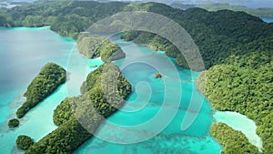 Aerial footage of a limestone islands in Rock Islands, Palau.