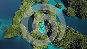 Aerial footage of a limestone islands in Rock Islands, Palau.