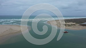 Aerial footage of the mouth of the River Murray in regional South Australia in Australia
