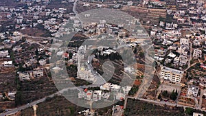 Aerial footage Over Palestinian Muslim Village with mosque