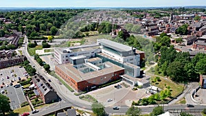 Aerial footage of the Pontefract Hospital located in the village of Pontefract in Wakefield in the UK on a sunny summers day