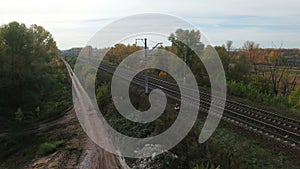 Aerial footage of railway and dirt road