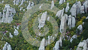 Aerial footage of rocky mountains during fall season